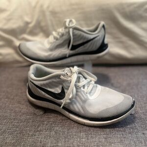 White and Black Nike Athletic Shoes